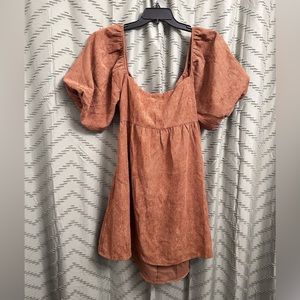 Blue rain mini dress size L 
bought from Francesca’s. 
Ties in the open